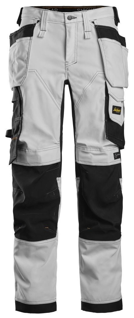Snickers Workwear - 6247 Pantalones largos elásticos de trabajo para mujer con bolsillos flotantes AllroundWork blanco/negro - Ferrotecnia