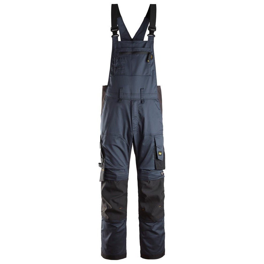 Snickers Workwear - 6051 Pantalones elásticos con peto y tirantes AllroundWork azul marino-negro - Ferrotecnia