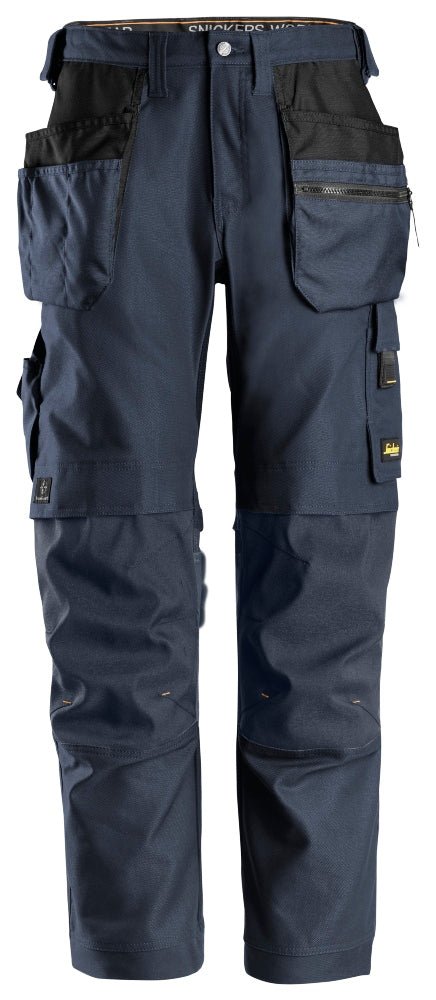 Snickers Workwear - 6224 Pantalones largos de trabajo elásticos AllroundWork Canvas+ con bolsillos flotantes color azul marino - Ferrotecnia