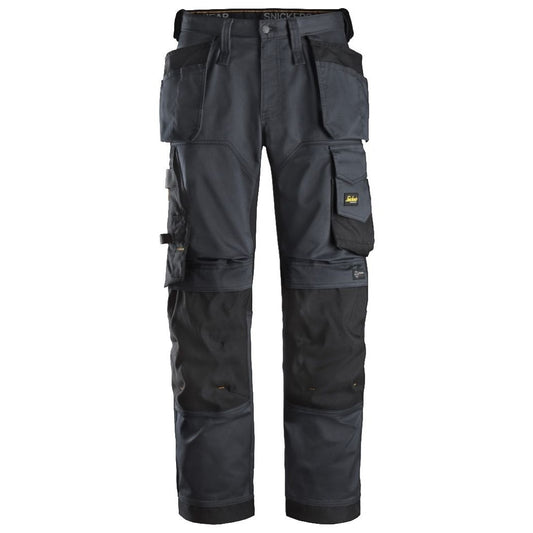Snickers Workwear - 6251 Pantalones largos de trabajo elásticos ajuste holgado AllroundWork Loose Fit con bolsillos flotantes color gris acero/ negro